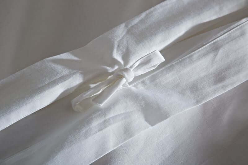 Pure white luxury Egyptian cotton super King elegant bedding set.