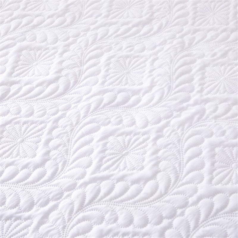 Quilted embossed waterproof mattress protector fitted sheet.